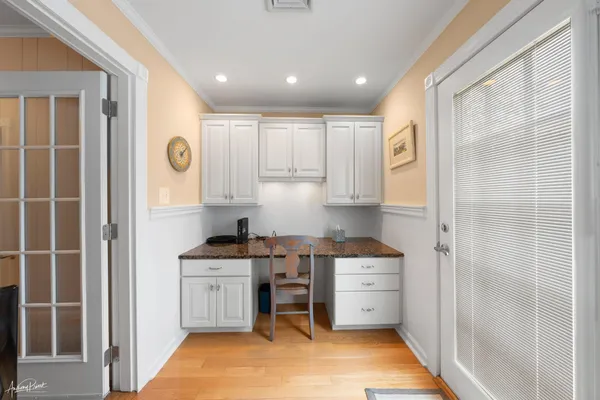 a kitchen with a stove a sink and a refrigerator
