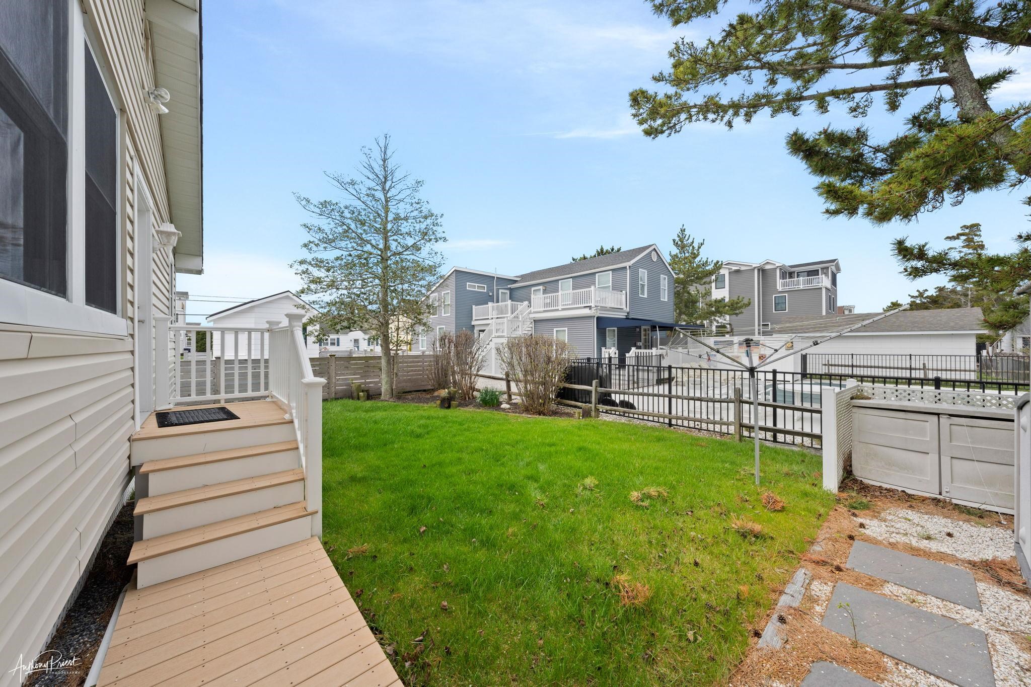 2968 First Avenue Avalon, NJ 08202 - Photo 22 of 23 a view of a house with a backyard