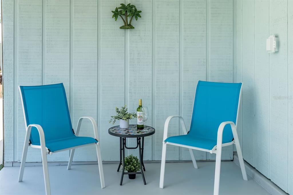 1317 Cocoanut Avenue, Unit B Sarasota, FL 34236 - Photo 13 of 36 a view of a dining room with furniture and wooden floor