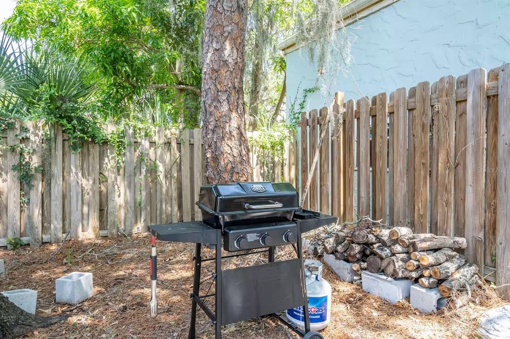 1317 Cocoanut Avenue, Unit B Sarasota, FL 34236 - Photo 16 of 36 a view of a balcony with chairs and a fire pit
