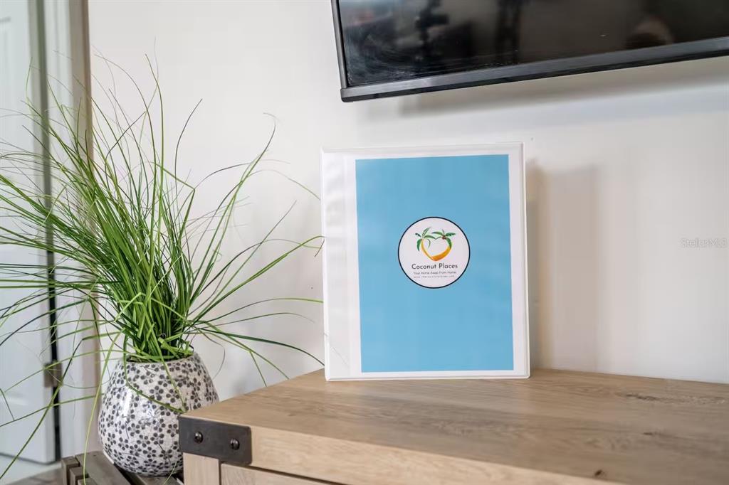 1317 13th Street, Unit B Sarasota, FL 34236 - Photo 28 of 36 a view of a door and chair