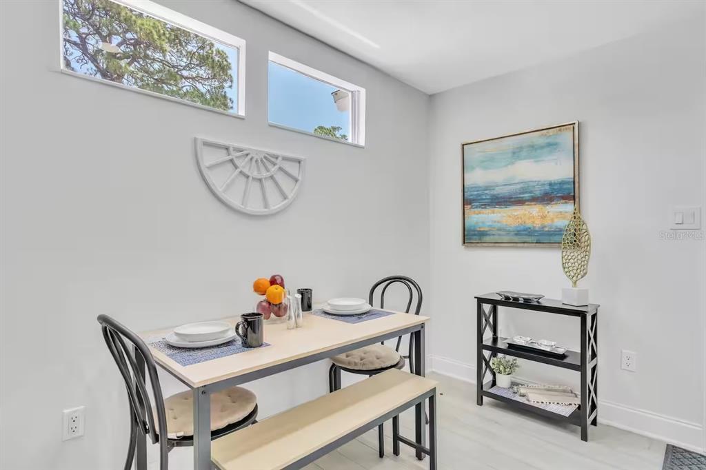 1317 13th Street, Unit B Sarasota, FL 34236 - Photo 34 of 36 a view of a workspace with furniture