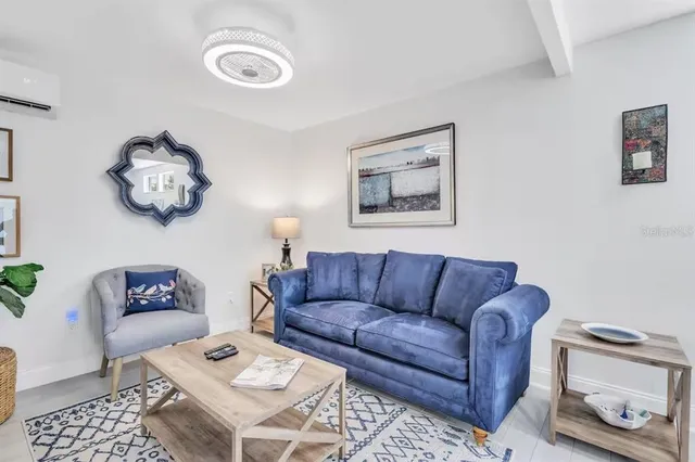 a living room with furniture and a couch