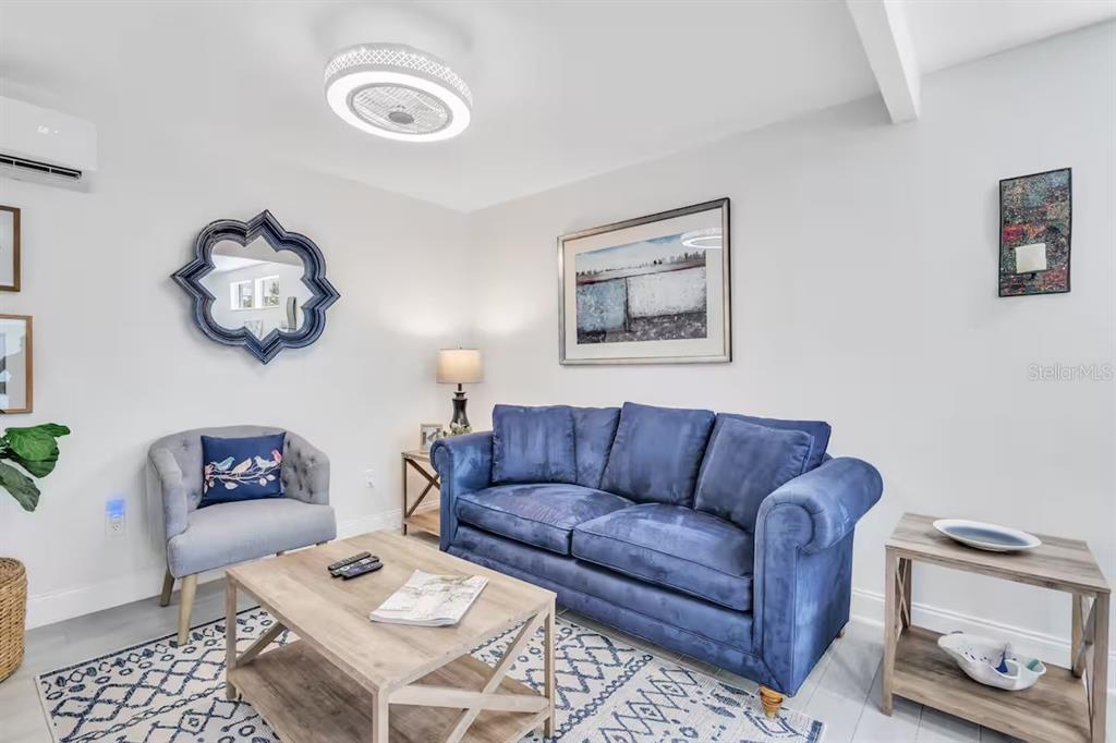 1317 Cocoanut Avenue, Unit B Sarasota, FL 34236 - Photo 9 of 36 a living room with furniture and a couch