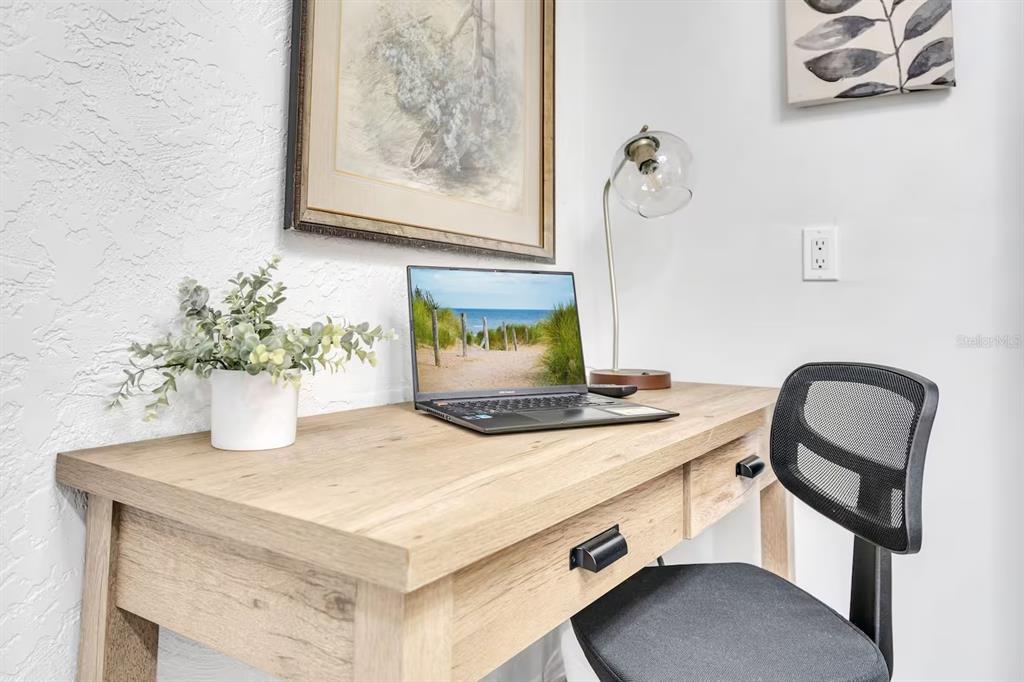 1317 13th Street, Unit B Sarasota, FL 34236 - Photo 9 of 36 a bathroom with a sink and a mirror