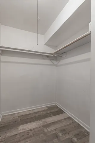 a view of an empty walk in closet