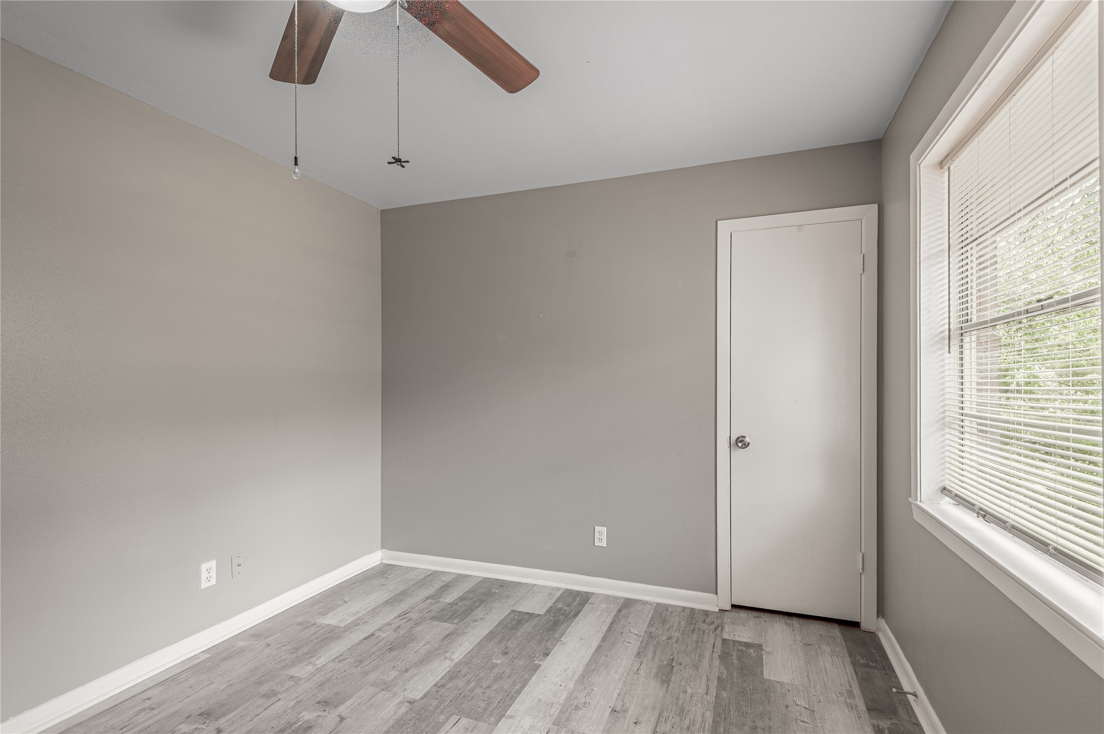818 University Avenue, Unit 7 Huntsville, TX 77320 - Photo 22 of 25 a view of an empty room with a window