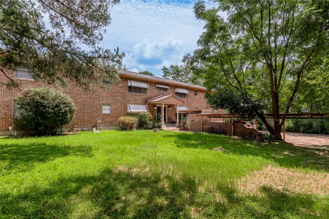 a house view with a garden space
