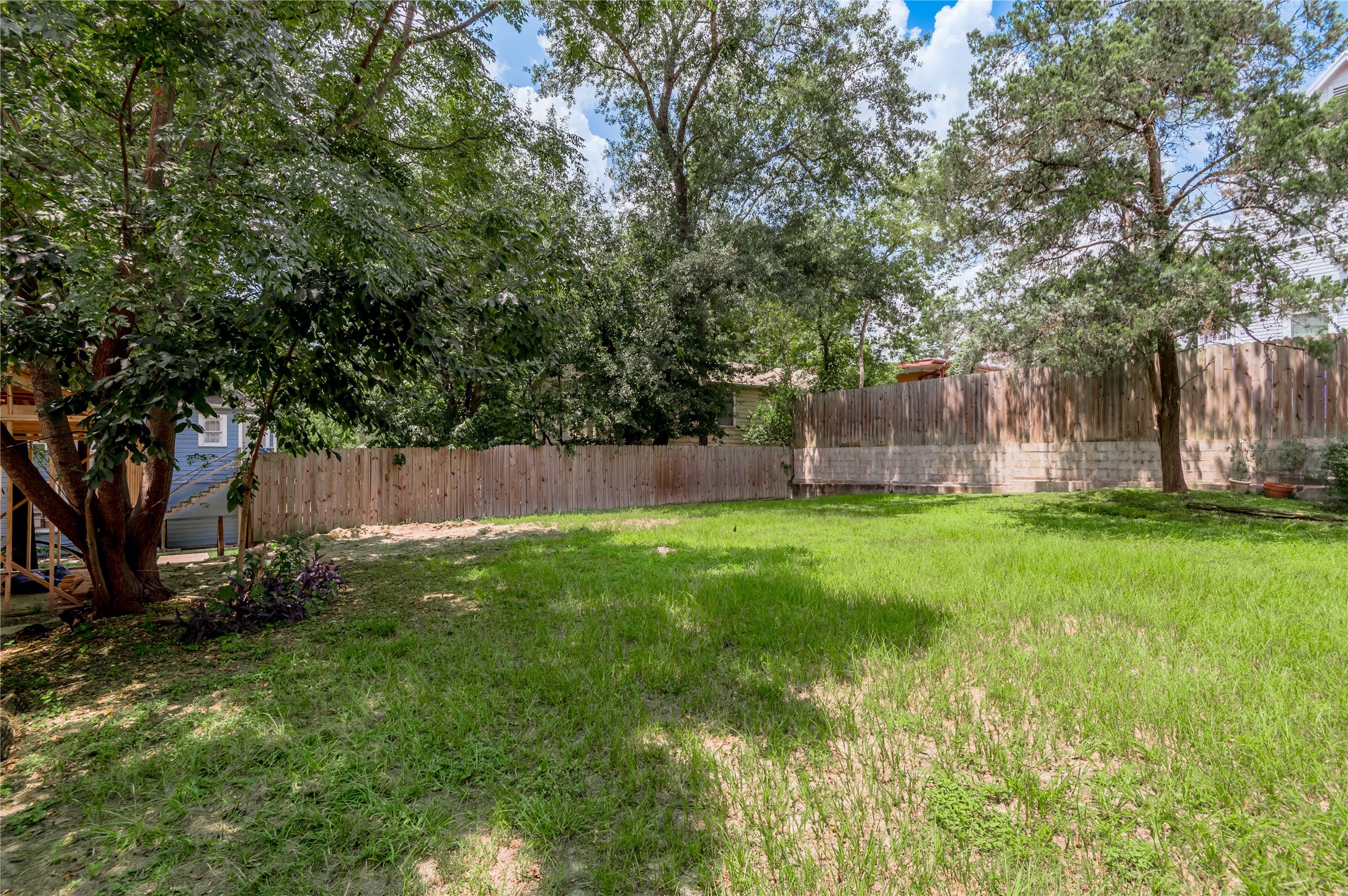 818 University Avenue, Unit 7 Huntsville, TX 77320 - Photo 25 of 25 a view of garden with trees