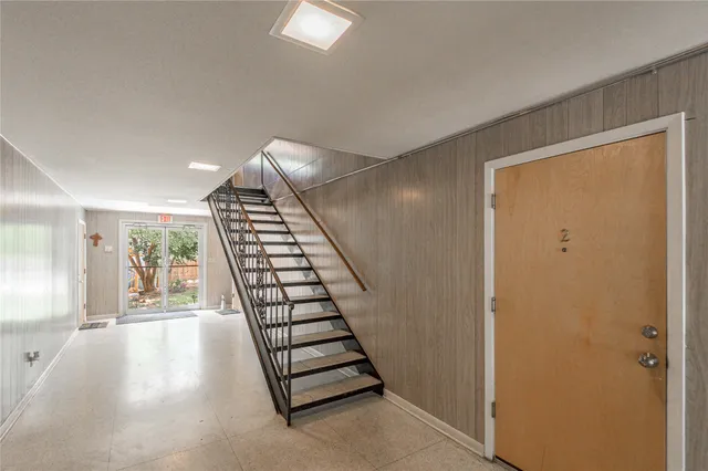 a view of entryway with wooden floor