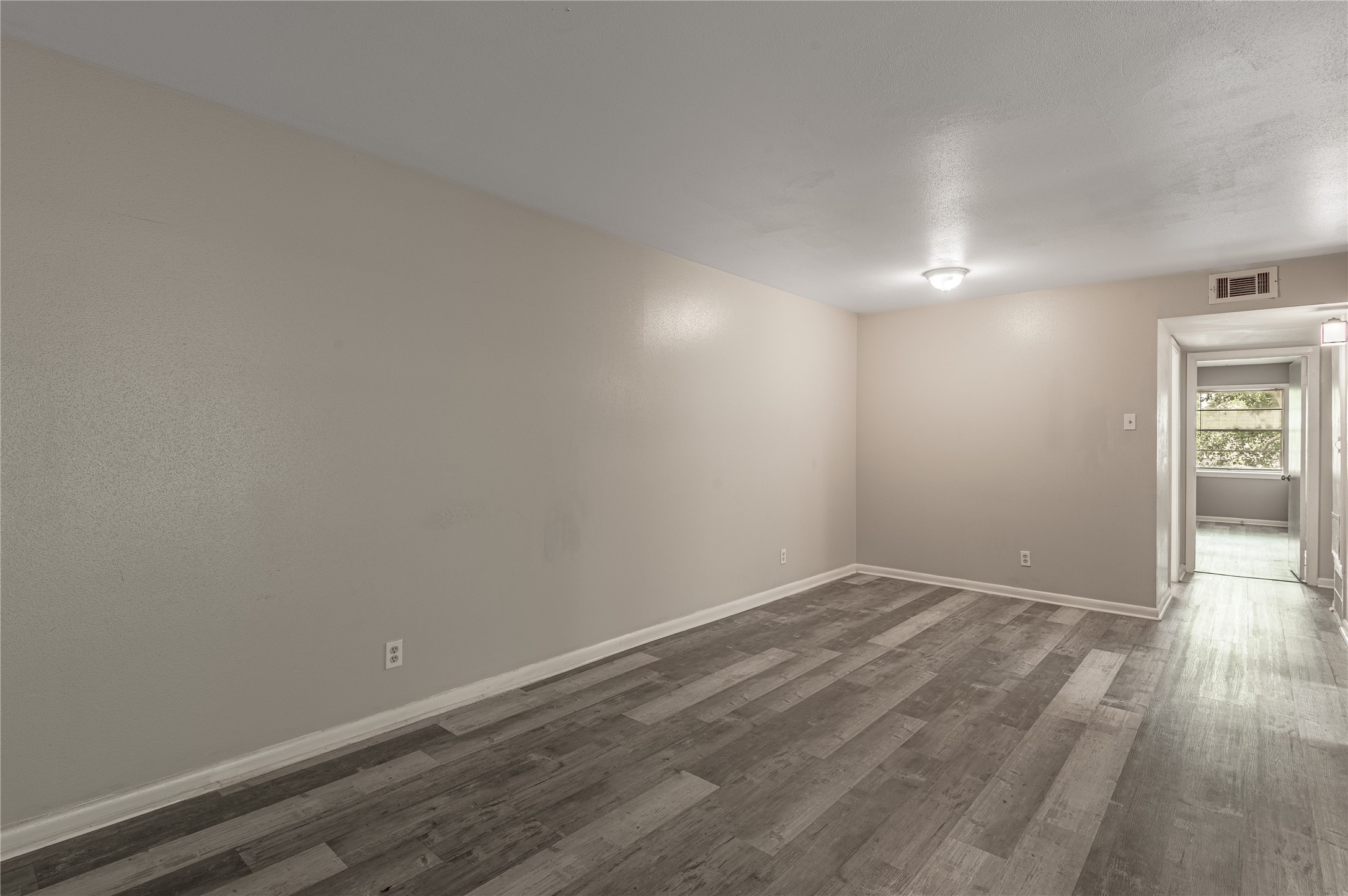818 University Avenue, Unit 7 Huntsville, TX 77320 - Photo 10 of 25 wooden floor in a room