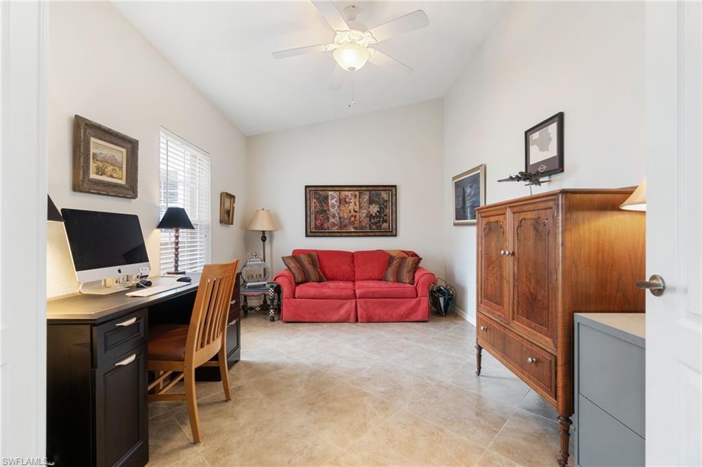 359 Dover Place, Unit E204 Naples, FL 34104 - Photo 24 of 49 a workspace with furniture and window