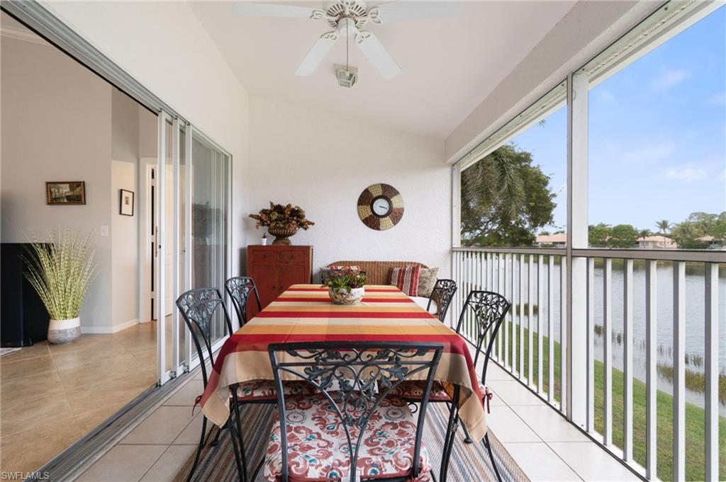 359 Dover Place, Unit E204 Naples, FL 34104 - Photo 36 of 49 a dining room with furniture and window