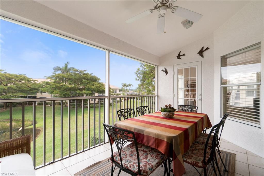 359 Dover Place, Unit E204 Naples, FL 34104 - Photo 37 of 49 a view of a dining room with furniture window and outside view