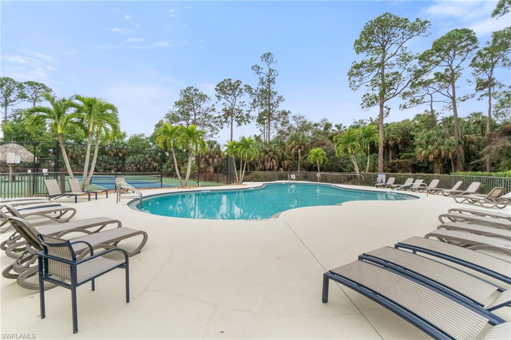 359 Dover Place, Unit E204 Naples, FL 34104 - Photo 49 of 49 a view of a swimming pool with a patio