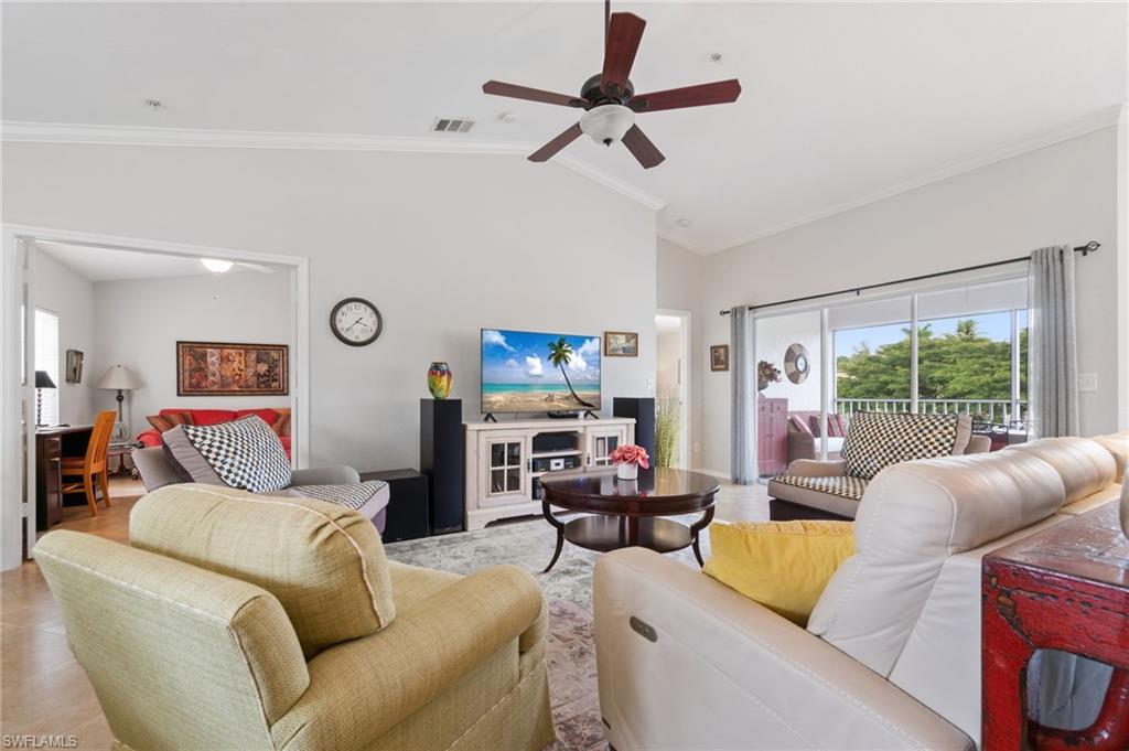 359 Dover Place, Unit E204 Naples, FL 34104 - Photo 8 of 49 a living room with furniture or couch and a ceiling fan
