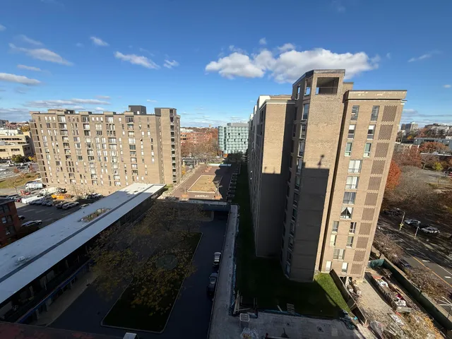 a view of balcony with wooden floor
