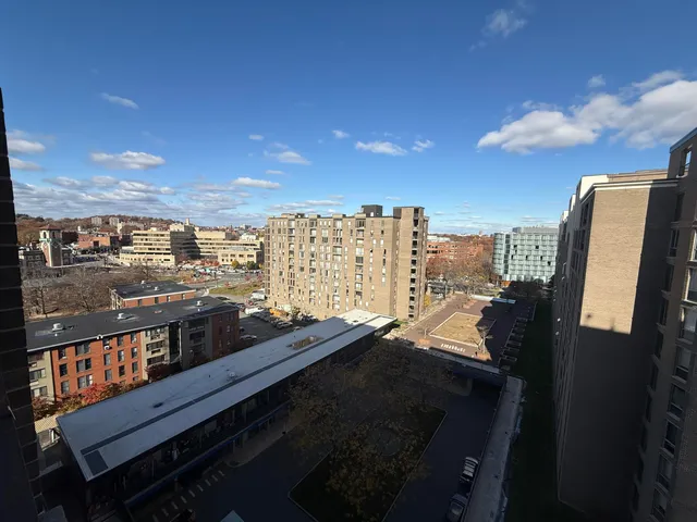 a view of a balcony with city view