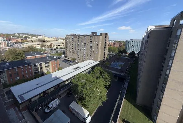 a view of a balcony with chairs