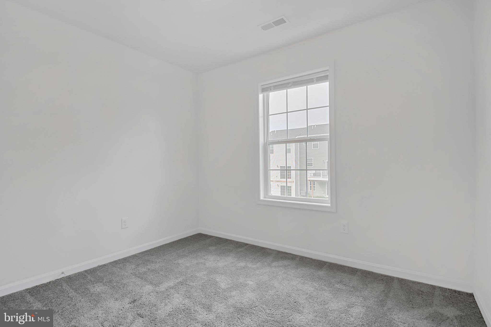 415 Hadley Lane Red Lion, PA 17356 - Photo 16 of 22 an empty room with a window