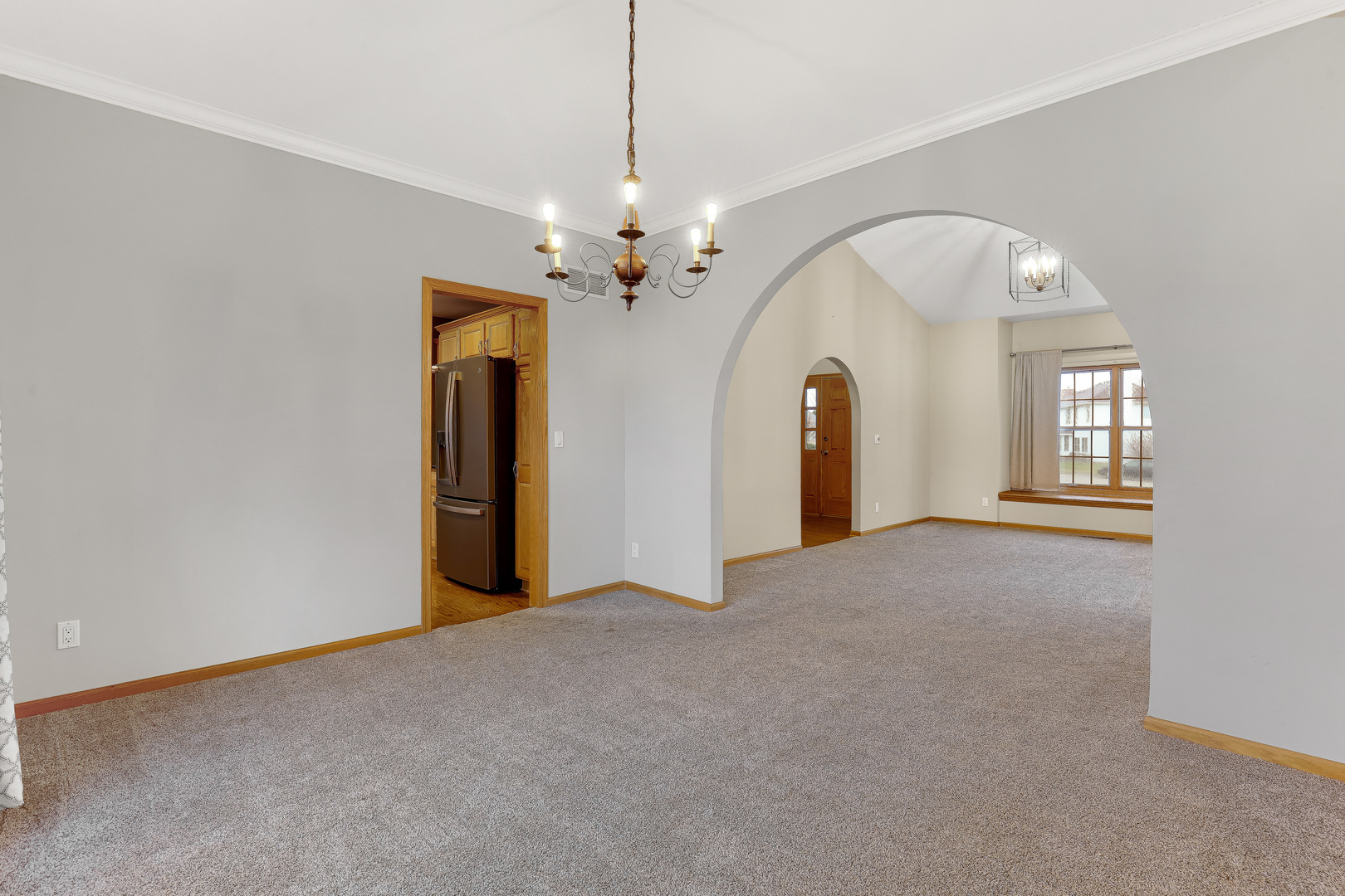 959 Willow Circle DeKalb, IL 60115 - Photo 20 of 39 a view of a room with chandelier and entryway