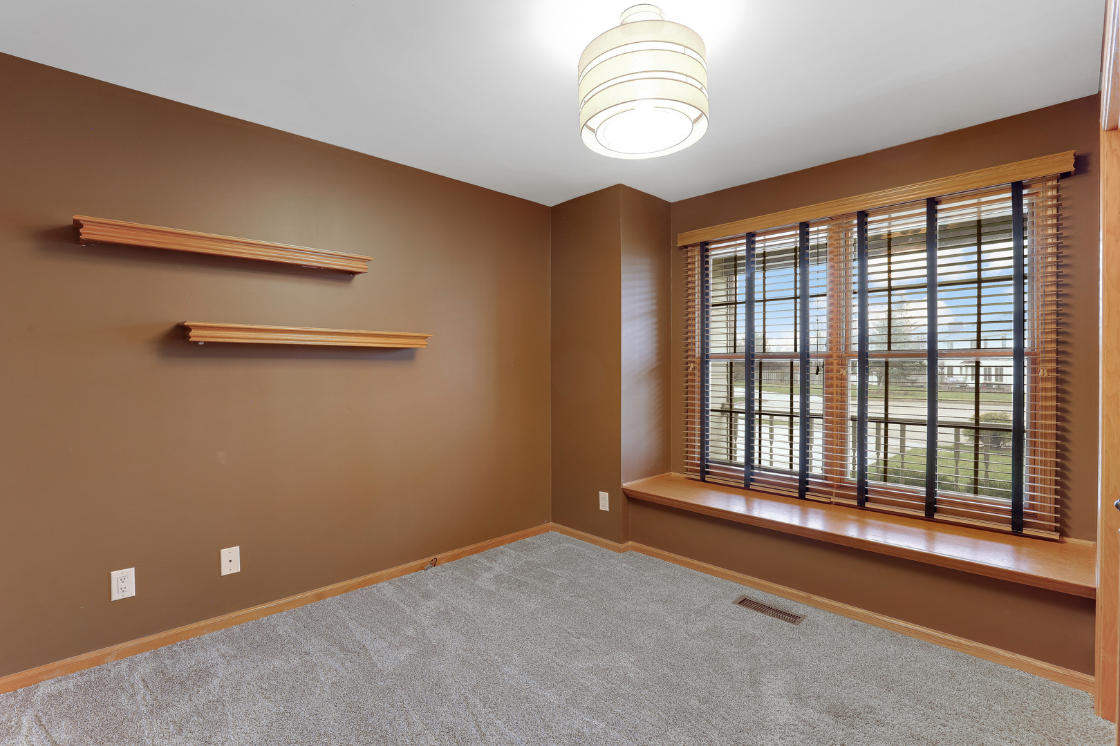 959 Willow Circle DeKalb, IL 60115 - Photo 23 of 39 a view of an empty room with a window