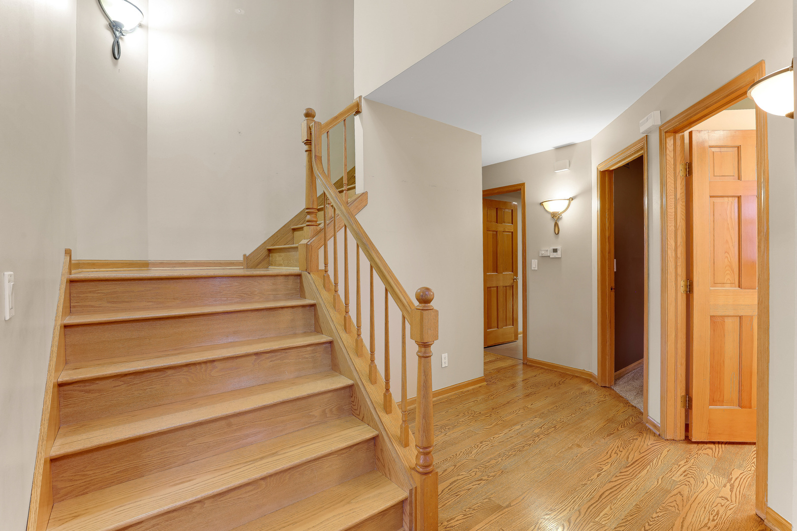 959 Willow Circle DeKalb, IL 60115 - Photo 26 of 39 a view of entryway with wooden floor and door