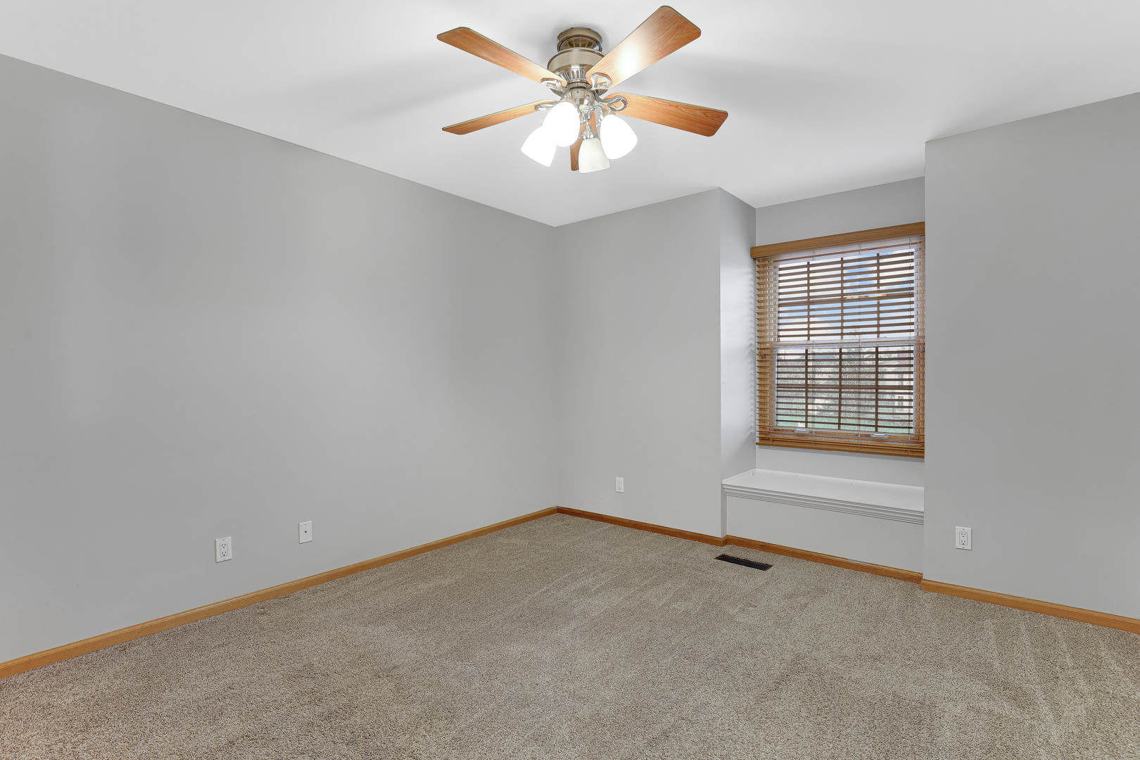 959 Willow Circle DeKalb, IL 60115 - Photo 32 of 39 wooden floor in an empty room with a window