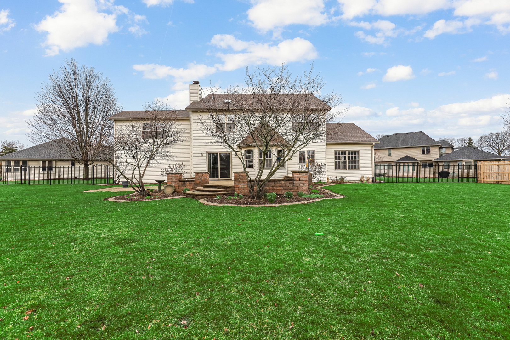959 Willow Circle DeKalb, IL 60115 - Photo 7 of 39 a view of a house with a yard