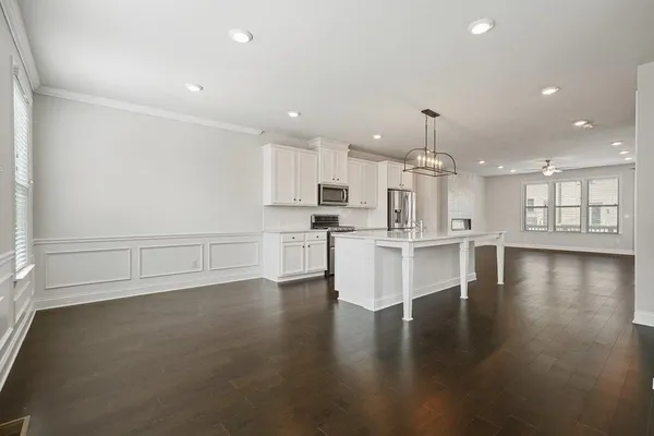a view of kitchen with table and window