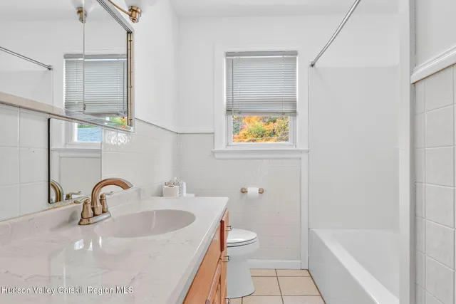 a bathroom with a sink and a bathtub