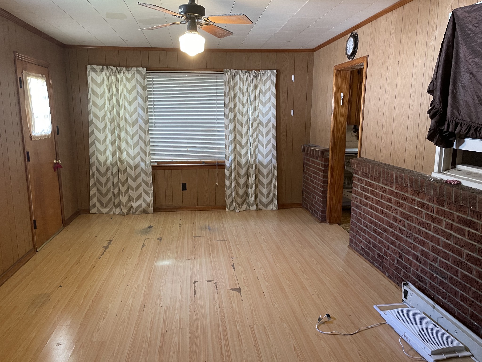 2004 Post Road Clarksville, TN 37043 - Photo 14 of 16 wooden floor in an empty room with a window