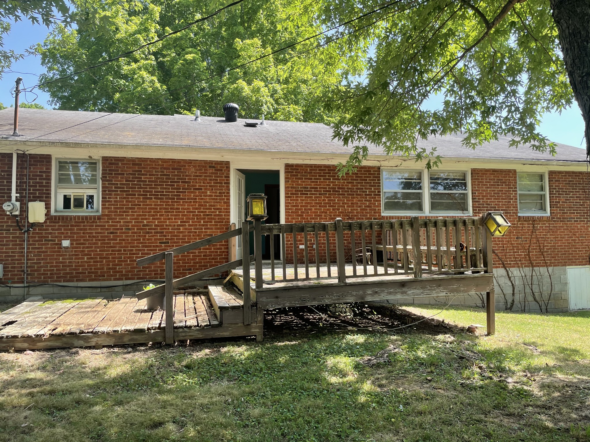 2004 Post Road Clarksville, TN 37043 - Photo 3 of 16 front view of a house with a yard