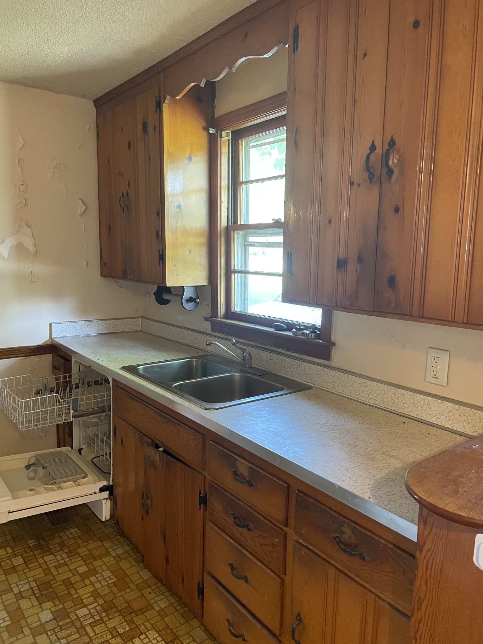 2004 Post Road Clarksville, TN 37043 - Photo 8 of 16 a kitchen with a sink and large window