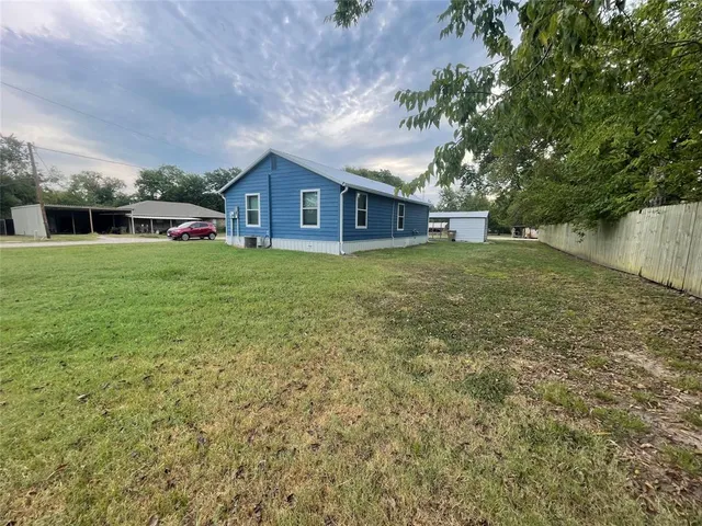 a house view with a garden space