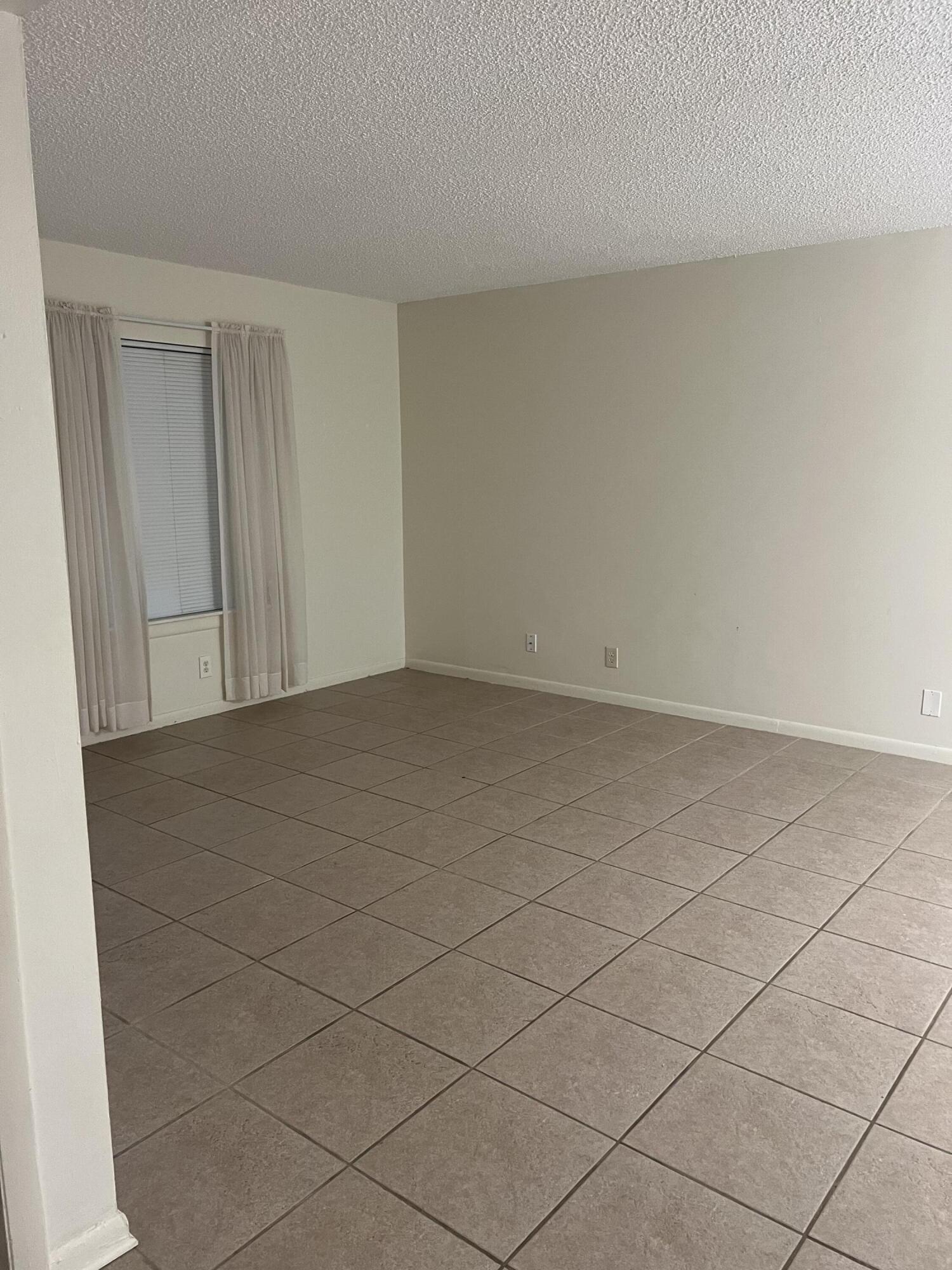 6272 Chasewood Drive, Unit B Jupiter, FL 33458 - Photo 5 of 9 IMG_4782