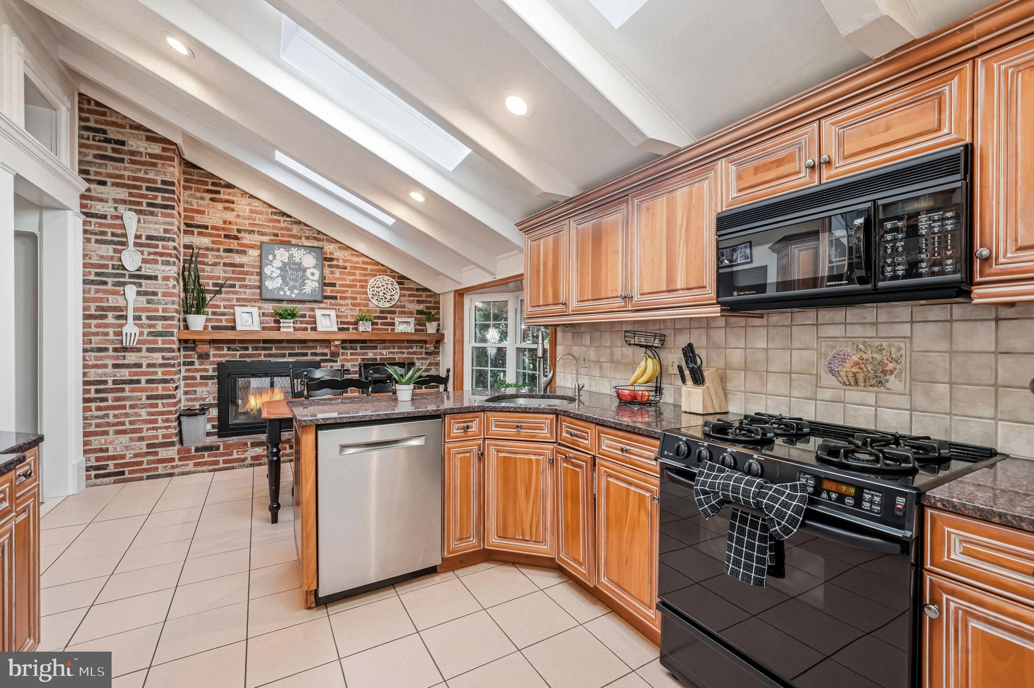 217 Red Stone Ridge Cherry Hill, NJ 08034 - Photo 18 of 44 a kitchen with stainless steel appliances granite countertop a stove and a sink