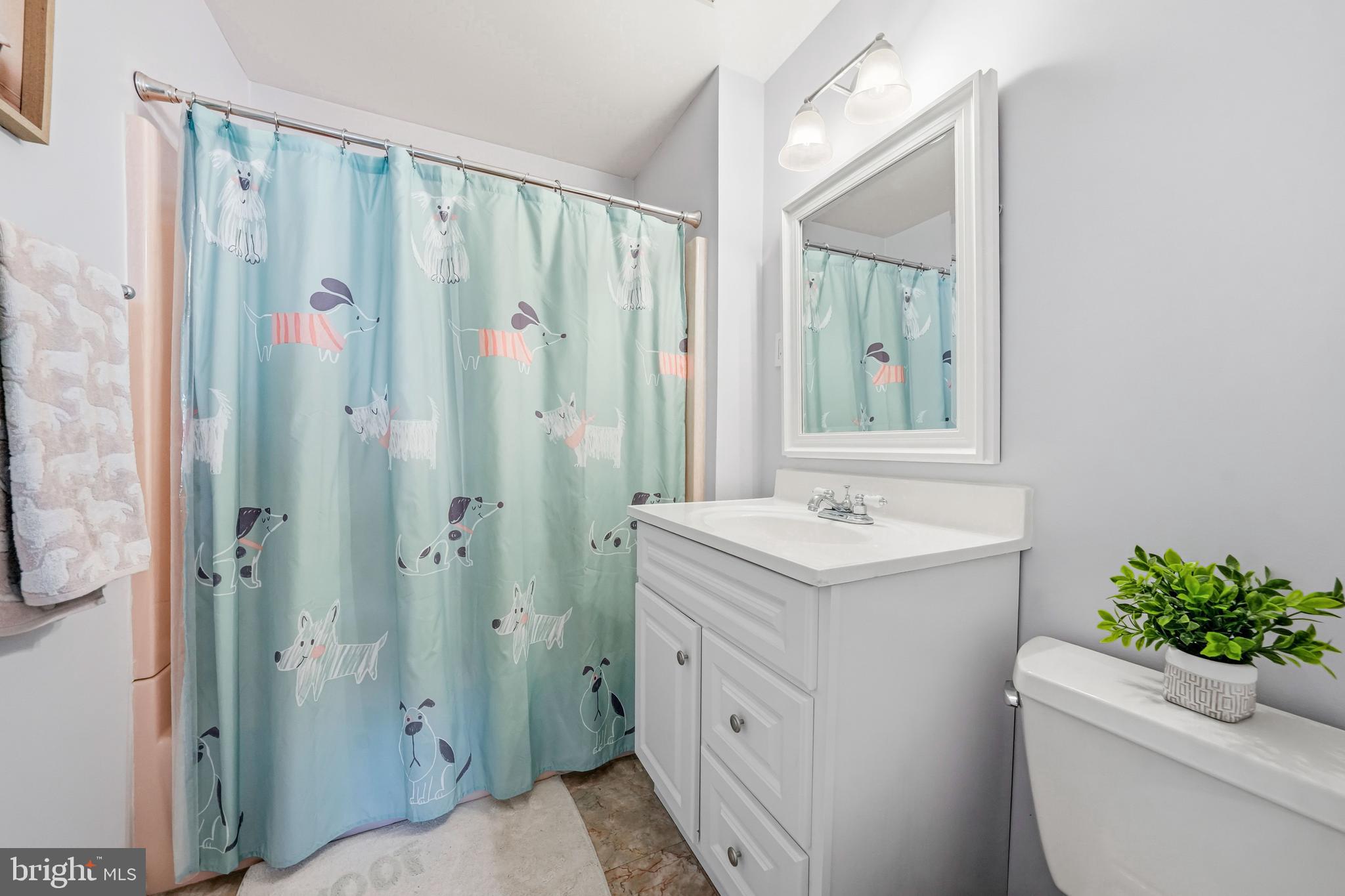 217 Red Stone Ridge Cherry Hill, NJ 08034 - Photo 28 of 44 a bathroom with a sink a toilet and shower