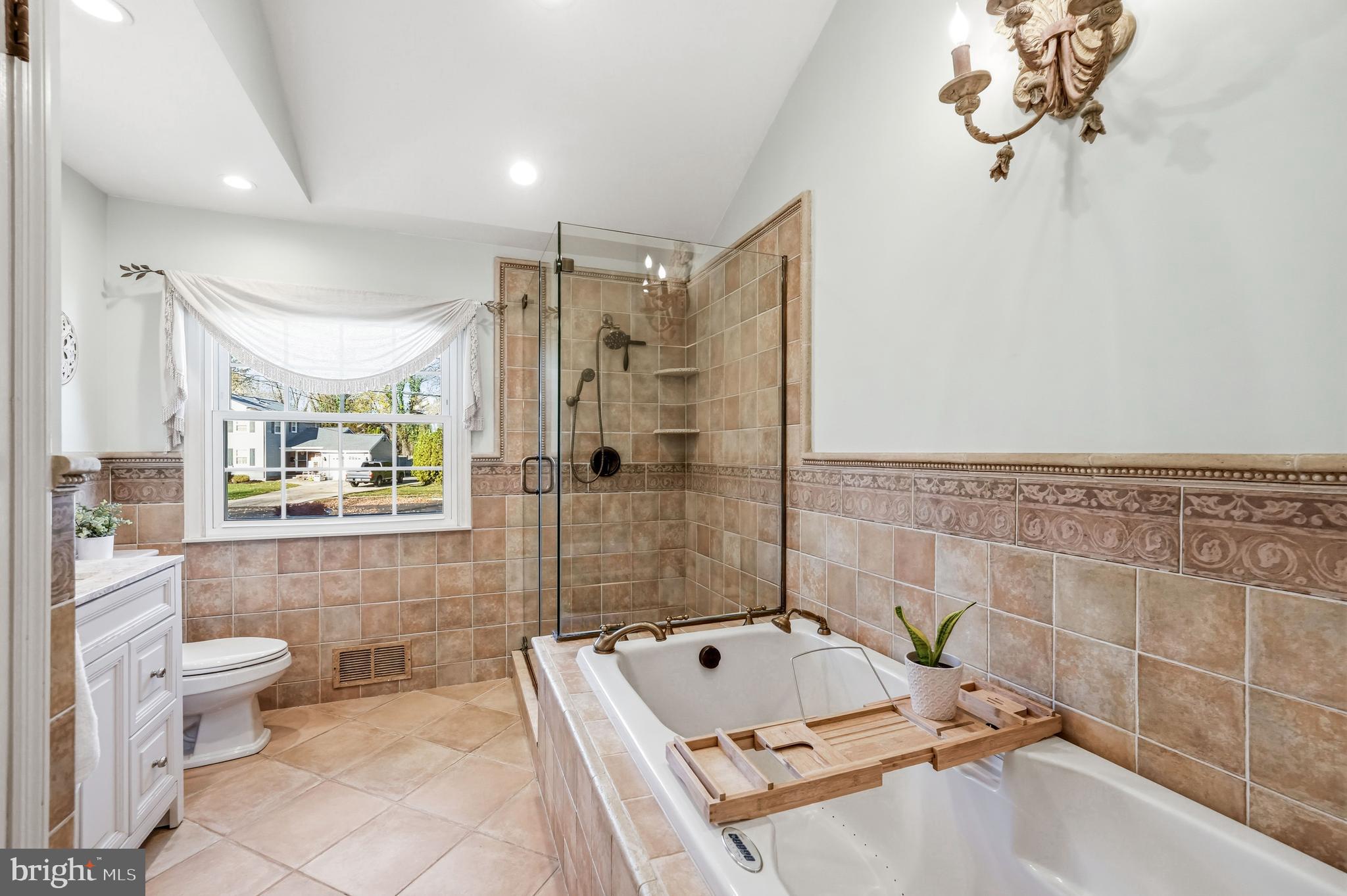 217 Red Stone Ridge Cherry Hill, NJ 08034 - Photo 29 of 44 a bathroom with a tub a sink and a shower