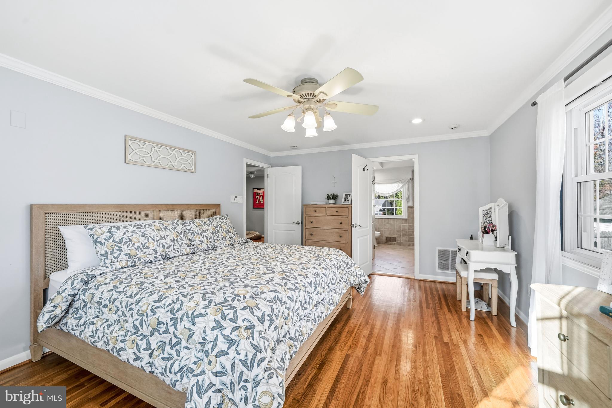217 Red Stone Ridge Cherry Hill, NJ 08034 - Photo 35 of 44 a bedroom with a large bed and a chandelier