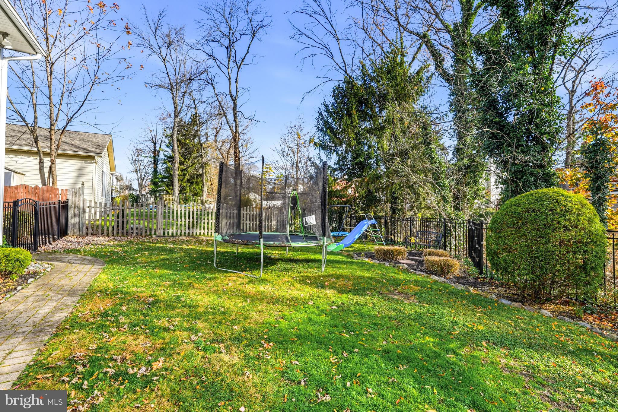 217 Red Stone Ridge Cherry Hill, NJ 08034 - Photo 42 of 44 a view of backyard with a slide and swing