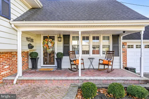 a view of a livingroom with wooden floor