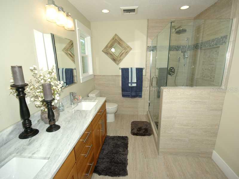 5017 Vanderipe Road Sarasota, FL 34241 - Photo 11 of 25 Master Bath - The beautiful master bath features dual sinks and a big walk-in shower.