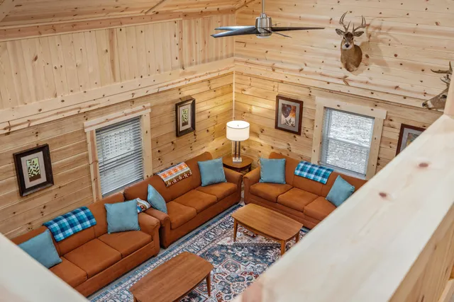 a blue bench sitting in front of a building