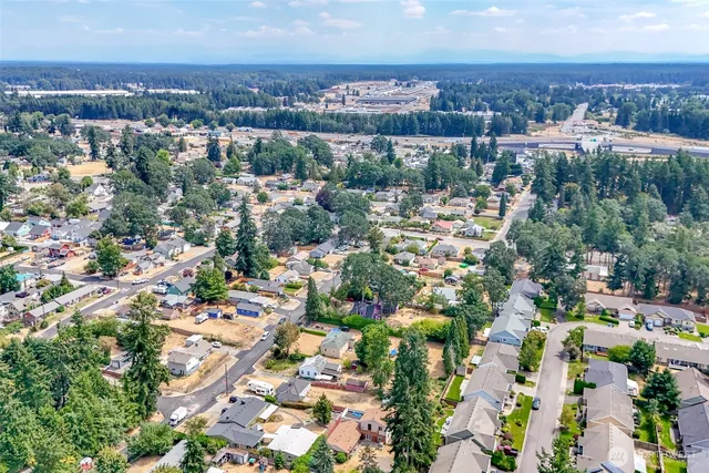 an aerial view of a city with lots of residential buildings