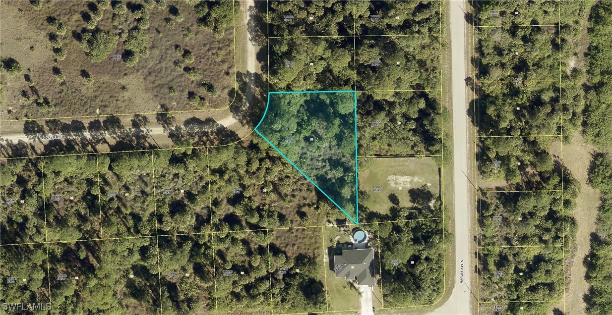 1259 Cavalier Circle Lehigh Acres, FL 33974 - Photo 1 of 8 view of balcony with wooden floor