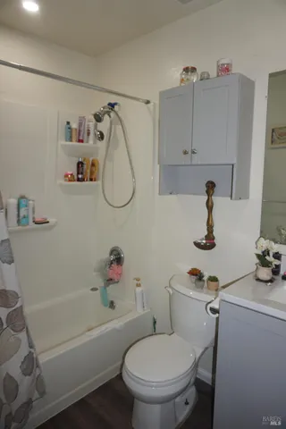 a bathroom with a sink toilet and bathtub