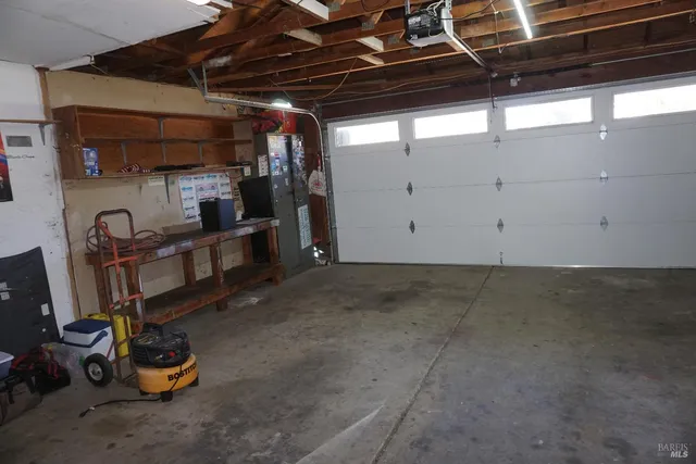 a view of room with gym equipment