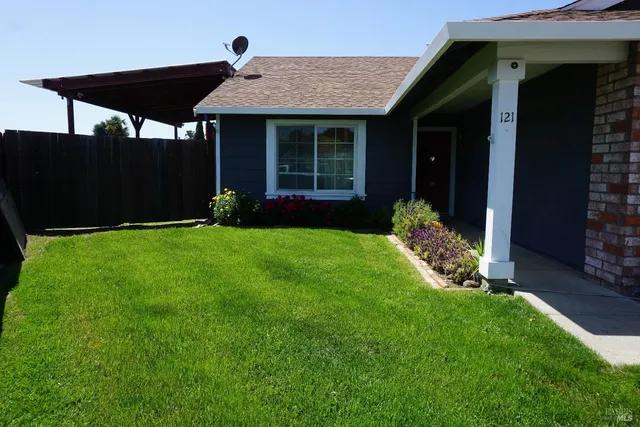 a view of a house with garden