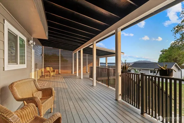 a view of a balcony with furniture